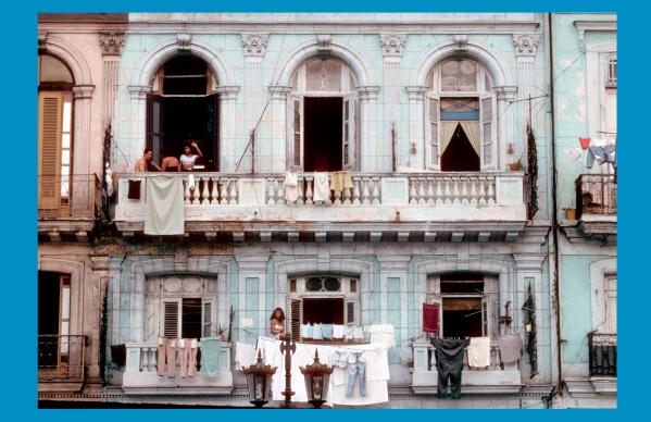 Havana Forever by Schiffer Publishing, Ltd. captures a pale blue, weathered building with open windows and balconies—classic Havana style. Clothes dry outside while two women chat above and another tends laundry below.