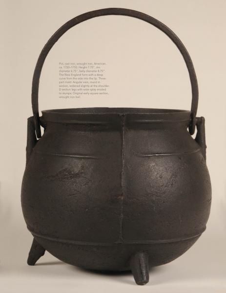 The book "Early American Cast Iron Holloware 1645-1900" by Schiffer Publishing, Ltd. showcases sturdy, antique cauldrons with three legs and curved handles, ideal for hearth cooking, against a plain background.
