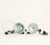 Schiffer Publishing, Ltd.'s "No Lumps, Thank You." is displayed side by side with large silver reflectors and black cameras connected by winding cords, set against a plain white background.
