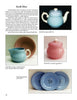 A page showcasing Schiffer Publishing, Ltd.'s Solid-Colored Dinnerware—vintage pastel ceramics like a blue teapot, blue creamer with pink sugar jar, and blue dessert plates—with descriptions and prices for each collectible piece.