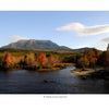 A river meanders through autumn foliage toward Mount Katahdin beneath a blue sky, capturing Maine’s scenic beauty—featured in "Maine" by Schiffer Publishing, Ltd.