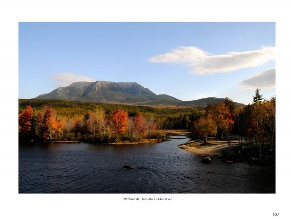 A river meanders through autumn foliage toward Mount Katahdin beneath a blue sky, capturing Maine’s scenic beauty—featured in "Maine" by Schiffer Publishing, Ltd.