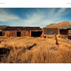 Experience the forgotten beauty of Northern California's back roads with "Back Roads of Northern California" by Schiffer Publishing, Ltd.—featuring vivid scenes of old wooden settlements, rusty machinery, and weathered buildings under open blue skies.