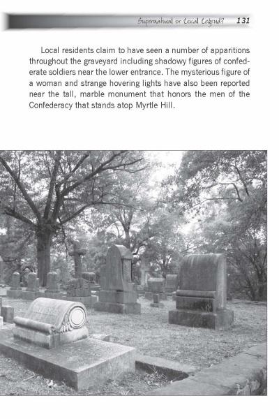 Black-and-white photo of an old graveyard with large tombstones among tall trees, evoking Atlanta ghost stories. Inspired by "Haunted History" from Schiffer Publishing, Ltd., it captures a quiet, eerie atmosphere of paranormal encounters.