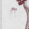 A decorative border frames a pale background. On the right, a detailed skull and spine illustration appears. Centered in gothic font with blood-like drips, “The Thrill of Repulsion” by Schiffer Publishing, Ltd. evokes classic horror style.