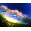 A vibrant underwater view of a breaking wave illuminated by sunlight in yellow, blue, and gold hues beneath a deep blue sky. Surfing photography by Jim Russi. Text at the bottom reads: Flying Through the Clouds, Schiffer Publishing, Ltd.