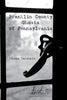 A black-and-white cover with an old window latch evokes the paranormal in Franklin County Ghosts by Schiffer Publishing, Ltd. The title and publisher appear over the glass, hinting at eerie tales within.
