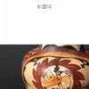 A round ceramic pot features bird and floral motifs in red, black, and tan on a dark background (image upside down, text "SENES" at top). Birds in the Barnes Foundation by Schiffer Publishing, Ltd.—great inspiration for art notecards.
