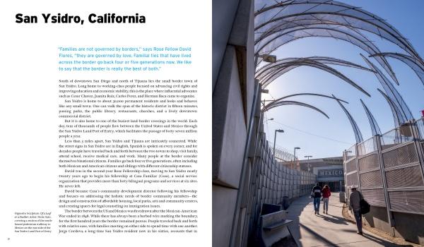 A group walks along a fenced path toward the Mexico border in San Ysidro, California, under a curved canopy, highlighting community development. "Design with Love" by Schiffer Publishing, Ltd. is featured on a white background to the left.