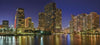 Featuring a city skyline and water, "Miami At Night" by Schiffer Publishing, Ltd. captures Miami’s vibrant essence—ideal for Miami photography or cityscape photography collections.