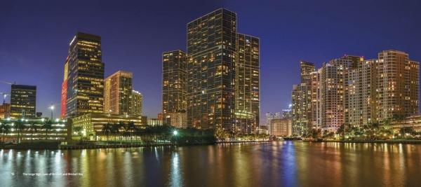 Featuring a city skyline and water, "Miami At Night" by Schiffer Publishing, Ltd. captures Miami’s vibrant essence—ideal for Miami photography or cityscape photography collections.