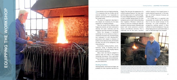 A person in a blue coat works at a blacksmith’s forge in a workshop, surrounded by tools and equipment. The right page of "The Book of Forging" by Schiffer Publishing, Ltd. displays text and images about blacksmithing techniques.