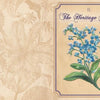 A vintage-style illustration features blue forget-me-not flowers with green leaves on beige. "Heritage Gardens" appears in elegant script, celebrating heirloom seeds from Schiffer Publishing, Ltd., with faint floral patterns in the background.