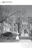 Black and white photo of a historic brick building with windows and central stairs. A car and person with dog out front. Caption: The Belvoir Winery in Liberty, featured in Campfire Tales Midwest by Schiffer Publishing, Ltd.