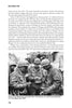 Black and white photo from Duty Before Self: The Story of the 781st Tank Battalion in World War II (Schiffer Publishing, Ltd.) shows soldiers in helmets and uniforms, one with a submachine gun, as a tank driver watches from a Sherman Easy Eight hatch.
