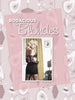 Retro Glamour Photography of Mark Anthony Lacy by Schiffer Publishing, Ltd. features vintage pinup shots of a blonde woman in lingerie, posing near a curtain with pale pink wallpaper and mid-century-inspired decor.