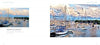 In "Miami, Real and Imagined" by Schiffer Publishing, Ltd., two pages feature Hank Klein’s Miami photography: left page—a smaller photo with text; right page—a vivid, large marina image with sailboats on calm water under a cloudy sky.