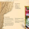 A recipe page from "Cooking Wild Game" by Schiffer Publishing, Ltd. showcases salt-encrusted pheasant with a European flair. The layout includes elegant script, warm colors, ingredient list, prep steps, and a small photo of herbs with pheasant.