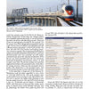 A Russian high-speed train races along snowy tracks with overhead wires and power lines, passing a signal. A bridge and cloudy sky appear in the background. "Fast Trains Worldwide" by Schiffer Publishing, Ltd. features info and data on global high-speed trains.