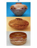 “Segmented Bowls for the Beginning Turner” by Schiffer Publishing, Ltd. showcases three wood-turned bowls: one round with geometric patterns, a flatter bowl with curved designs, and a shorter bowl featuring wide decorative bands.