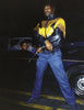 Greg Batman Davis by Schiffer Publishing, Ltd. features a confident figure in a leather and yellow jacket, gun in hand, with two women in a dark car behind him at night, capturing the aura of an Original Gangster.