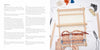 A hand uses a fork to press orange and blue yarn onto a wooden loom surrounded by labeled tools on a white surface, with instructions from Schiffer Publishing, Ltd.'s "Weaving"—ideal for learning sustainable weaving techniques.