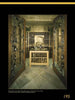 Wine Cellar Design by Schiffer Publishing, Ltd. features glass doors, metal vine accents, a central wooden wine rack, wall shelves, tiled floors, and warm lighting to elevate any luxury home's ambiance.