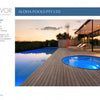 At sunset, a modern backyard features a rectangular pool and circular spa on a wooden deck by a glass-walled house, as seen in Schiffer Publishing, Ltd.'s "International Award Winning Pools, Spas, and Water Environments IV.