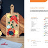 Schiffer Publishing, Ltd.’s "Paper Joy for Every Room" features creative DIY paper projects—crab, shrimp, lemon slices, herbs—displayed on a chopping board and tray. Nearby are napkins and more paper crafts for charming home decor accents.