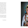 A young Tibetan girl in traditional attire and jewelry gazes calmly at the camera, echoing the power of human portraits featured in "Human Tribe" by Schiffer Publishing, Ltd.
