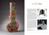 On the left, Intersection—a colorful upright guitar case reflecting contemporary art—stands out. On the right, Schiffer Publishing, Ltd.’s book spread features text, a coiled object on a stand, and a black-and-white portrait of a man.