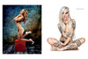 Featured in "Alvarado's Pin-up Nudes, 2nd Edition" by Schiffer Publishing, Ltd., two women pose nude in classic pin-up style—one with long hair on a red cube, the other a tattooed blonde seated cross-legged—capturing vintage artistry.