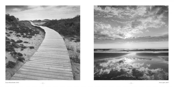 A wooden walkway leads to the shore, capturing the timeless beauty of East Coast Atlantic Beaches, as featured in Schiffer Publishing, Ltd.’s evocative photography collection.
