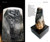 On the left is "Scrimshaw in Theory and Practice" by Schiffer Publishing, Ltd., open to an impala and mammoth ivory eye sketch; on the right, a carved mammoth tooth with a falcon’s face stands vertically on a pedestal.