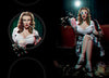 A woman sitting in a chair with popcorn and a straw channels classic pin-up girls, evoking the style of Celeste Giuliano's Pin-ups in 3-D from Schiffer Publishing, Ltd.