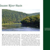 Delaware River Reflections by Schiffer Publishing, Ltd. captures scenic views of the Delaware River with lush green hills and clear skies, as highlighted in its detailed informational displays.