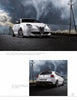 A white Alfa Romeo MiTo hatchback is shown on a rural road, evoking the sleek design and racing heritage explored in Schiffer Publishing, Ltd.'s "Alfa Romeo: A Century of Innovation.