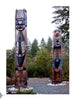 Contemporary Art on the Northwest Coast" by Schiffer Publishing, Ltd. showcases tall, colorful totem poles with carved animal and human figures set outdoors among trees, highlighting Northwest Coast native artistry.
