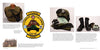 A display features a green jacket, 1st Platoon 3-64 Armor patch, helmet with goggles, documents, black combat boots, dog tag, group photo of soldiers, and M1 Abrams tank history from Schiffer Publishing, Ltd.