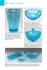 A catalog page features "Colors & Patterns of Depression Era Glassware" by Schiffer Publishing, Ltd., showcasing collectible blue Hazel Ware glassware—vase, bowl, dish, cups, and plates—with detailed patterns and prices.