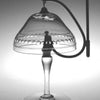 The “American Glass Bells” by Schiffer Publishing, Ltd. showcases exquisite glass craftsmanship—rounded, patterned shades rest on stemmed bases, making this elegant collection perfect for any glass enthusiast or collector.