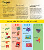 The instructional page "Paper" by Schiffer Publishing, Ltd. features colorful kids' paper craft images, a star-rated difficulty guide, supply lists, and explanations. Crafts include animals, objects, and baskets.