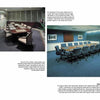 Two photos from "Power Rooms" by Schiffer Publishing, Ltd. show two conference rooms: one with a dark wood table, ten chairs, and blue carpet; the other more contemporary with a large oval table, many chairs, gray carpet, art, and office lighting.