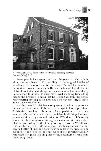 A black-and-white photo of Woodburn Mansion, a two-story brick house, appears in "Ghosts of the Revolutionary War" by Schiffer Publishing, Ltd., illustrating ghost stories and chilling legends from the thirteen colonies.