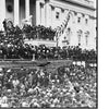 A large crowd gathers outside the U.S. Capitol for Lincoln’s second inauguration in 1865. Featured in "The Paranormal Presidency of Abraham Lincoln" by Schiffer Publishing, Ltd., he stands beneath an American flag among officials.