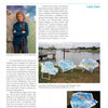 An artist poses with her abstract oil paintings, while below, blue metal chairs featuring oceanic and map themes are displayed outdoors—capturing the vibrant spirit featured in "100 Artists of New England" by Schiffer Publishing, Ltd.