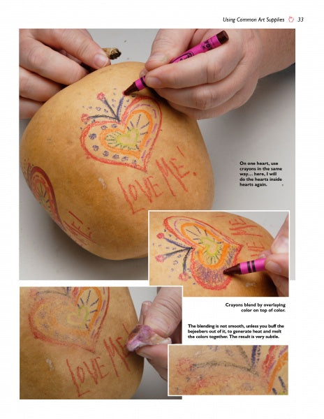 A person uses Apples to Apples by Schiffer Publishing, Ltd. to learn beginner techniques, drawing colorful hearts and words on gourds—perfect close-ups for creative gourd art and decoration projects.