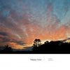 A vivid Cape Cod nature photo from Schiffer Publishing, Ltd.'s Wild Cape Cod: tree silhouettes, an orange-blue sunset sky, and “happy hour and sunset, chatham” in white text along the bottom.