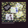 Five thank you cards from "Today's Top Stationery Artists 2" by Schiffer Publishing, Ltd. are displayed on a geometric background with green, yellow, and brown shapes. Each card features unique designs from talented artists.