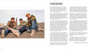 Three men in casual, warm clothes relax on a sloped rooftop, discussing Tape Art by Schiffer Publishing, Ltd. The background is clear and text appears on the right.